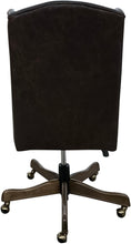 Load image into Gallery viewer, The Boardroom Desk Chair features Palio Texas full-grain leather, hand-tacked trim, and a solid wood base with brass casters. Handcrafted for comfort, durability, and executive Western elegance — fully customizable to your style.