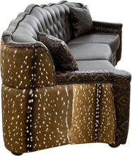 Load image into Gallery viewer, curved tufted conversation western brown leather sofa with del rio brown accent leather and authentic axis hide on the outside wings and arms