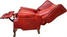 Load image into Gallery viewer, The Paloma Wingback Recliner pairs full-grain crimson leather with handcrafted wood details and a smooth reclining design. A bold expression of Western sophistication — built for beauty, comfort, and lasting craftsmanship.