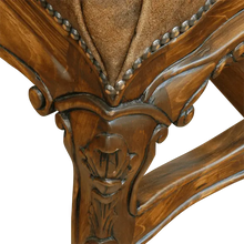 Load image into Gallery viewer, The Matador Dining Chair combines embossed full-grain leather, hand-carved hardwood, and Spanish Colonial artistry. A luxurious Western dining chair handcrafted for beauty, comfort, and endurance. Fully customizable and guaranteed for life.