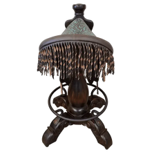 Load image into Gallery viewer, The Mustang Saddle Barstool features embossed turquoise leather, full-grain leather panels, and a hand-forged medallion on a 180° swivel wood base. A handcrafted Western saddle barstool celebrating the artistry and heritage of the American West.