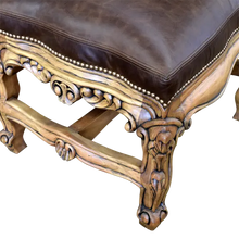 Load image into Gallery viewer, The Picador Dining Chair features full-grain leather upholstery, embossed floral detailing, and hand-carved hardwood. A Spanish Colonial-inspired dining chair blending Western luxury with artisanal craftsmanship. 100% customizable and guaranteed for life.