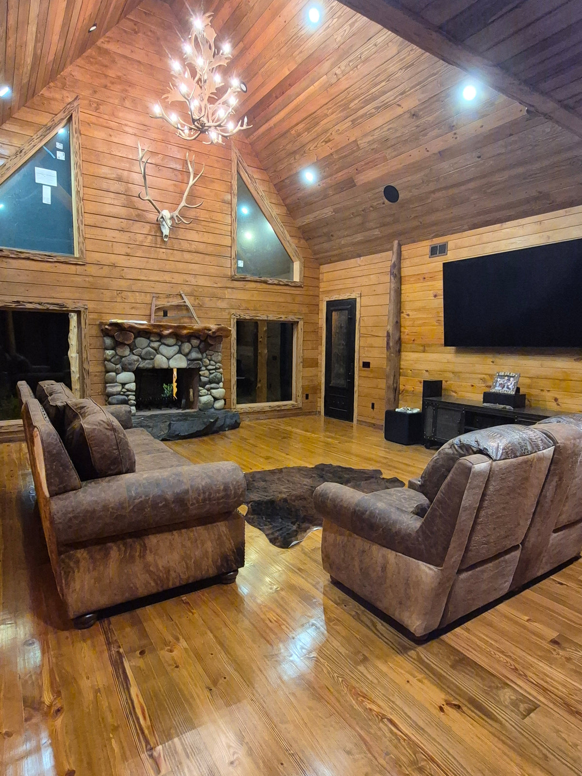 An arrangement of western leather and hide furniture custom designed for clients.