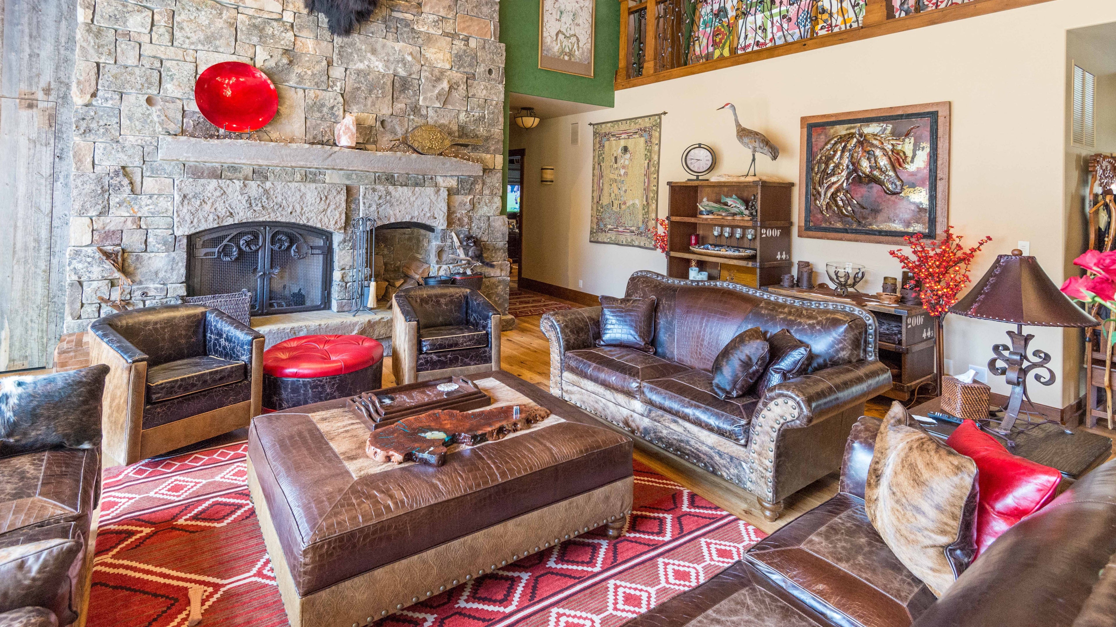 An arrangement of western leather and hide furniture custom designed for clients.