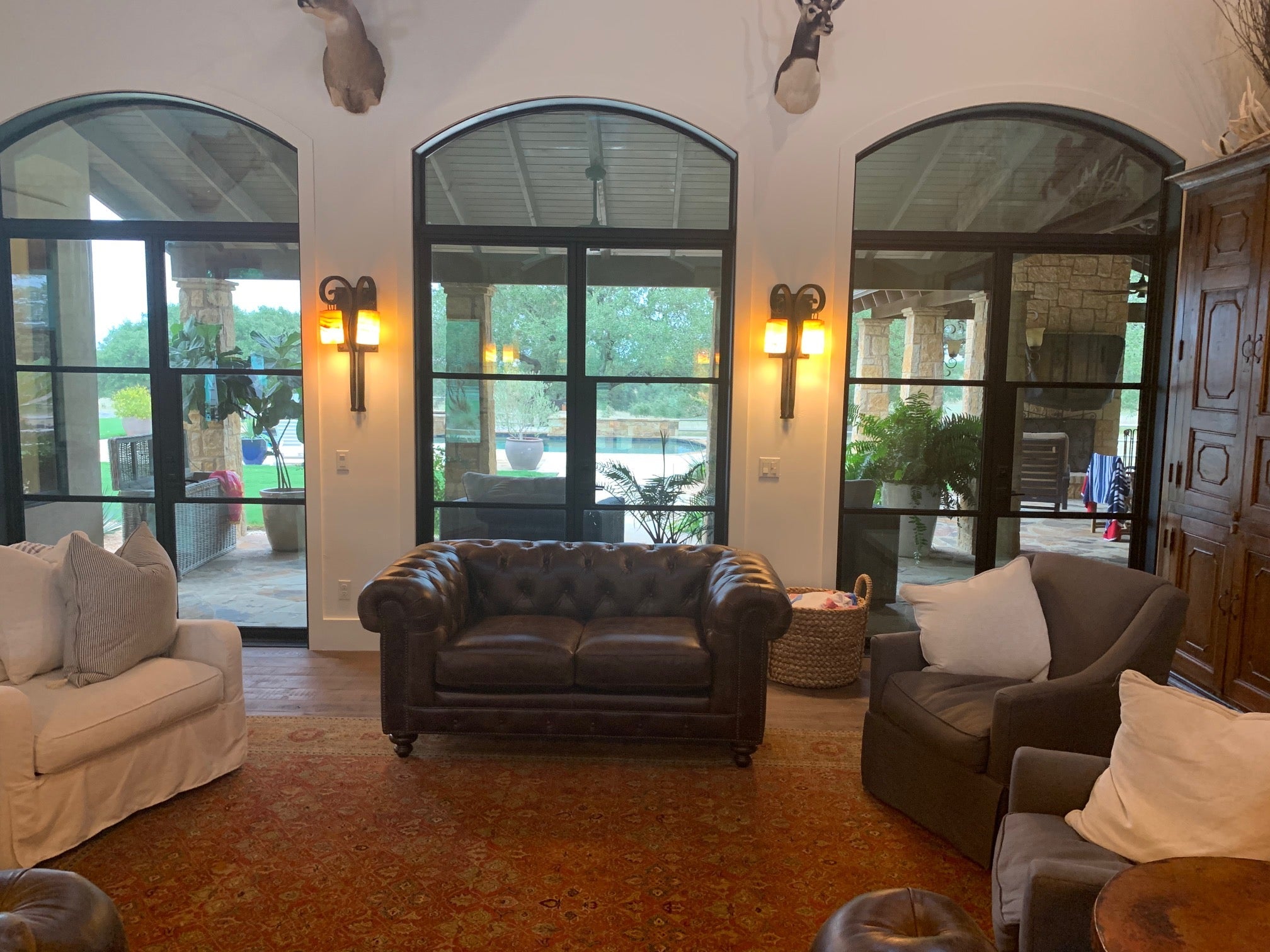 An arrangement of western leather and hide furniture custom designed for clients.