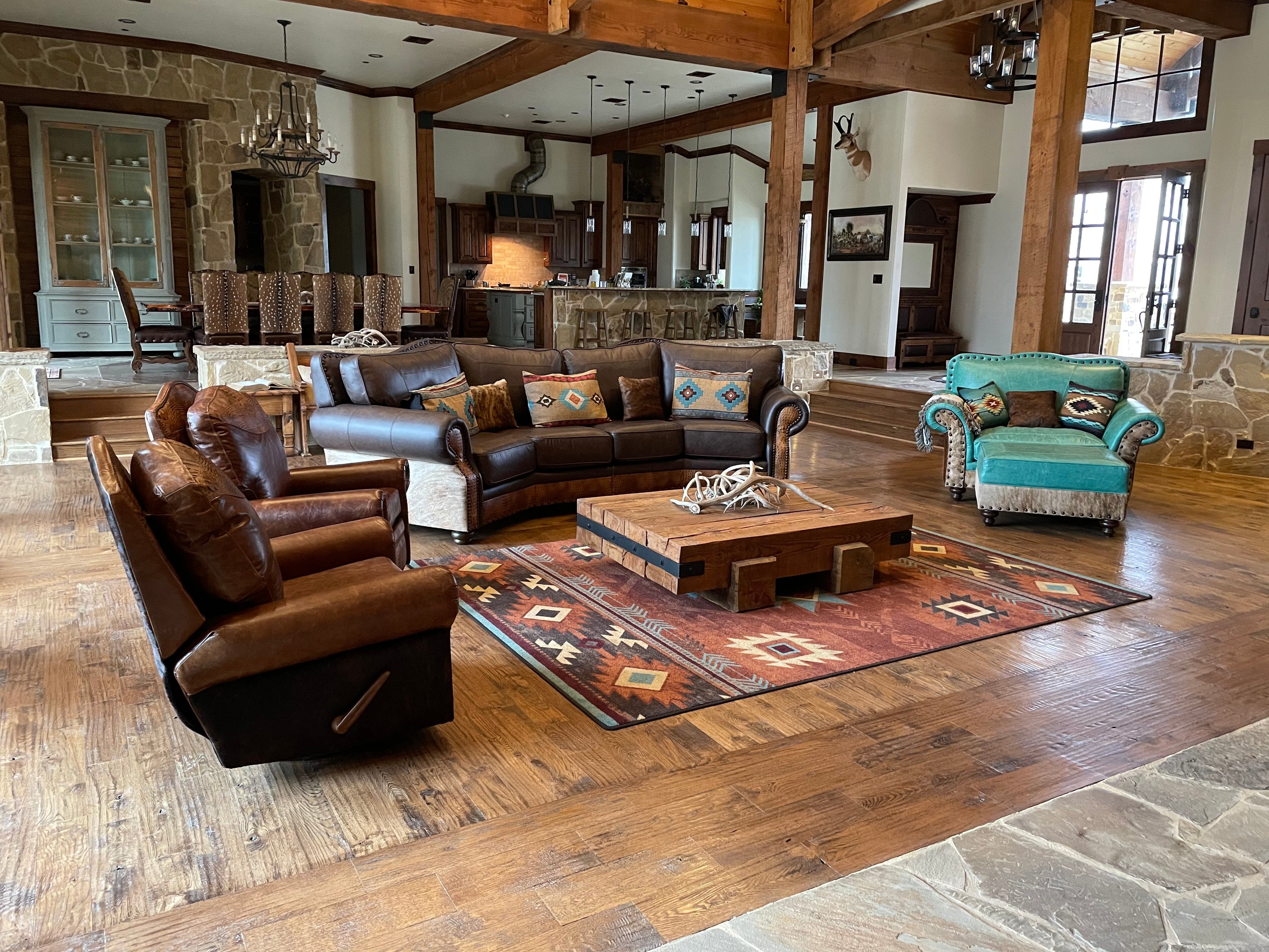 An arrangement of western leather and hide furniture custom designed for clients.