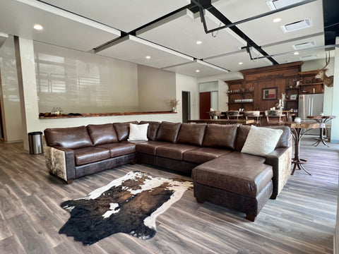 An arrangement of western leather and hide furniture custom designed for clients.