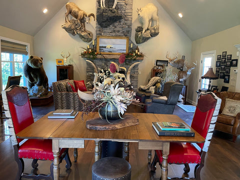 An arrangement of western leather and hide furniture custom designed for clients.