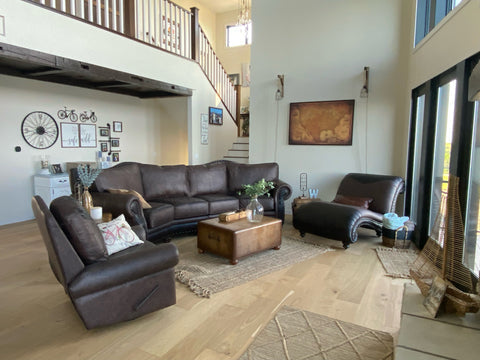 An arrangement of western leather and hide furniture custom designed for clients.