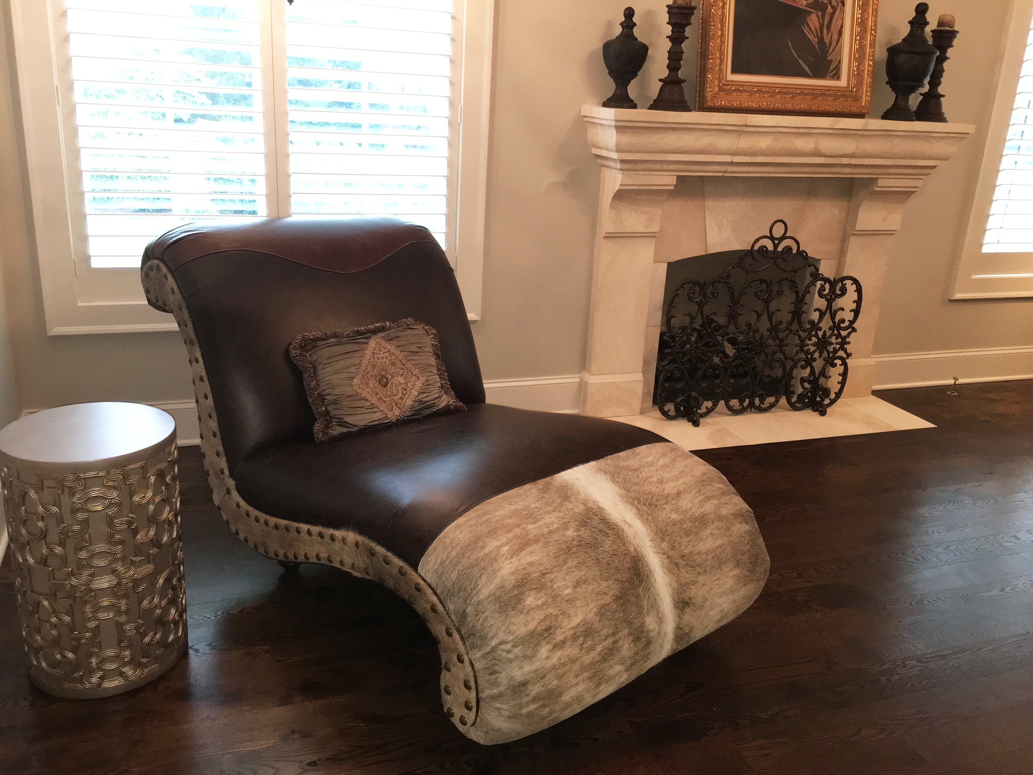 An arrangement of western leather and hide furniture custom designed for clients.