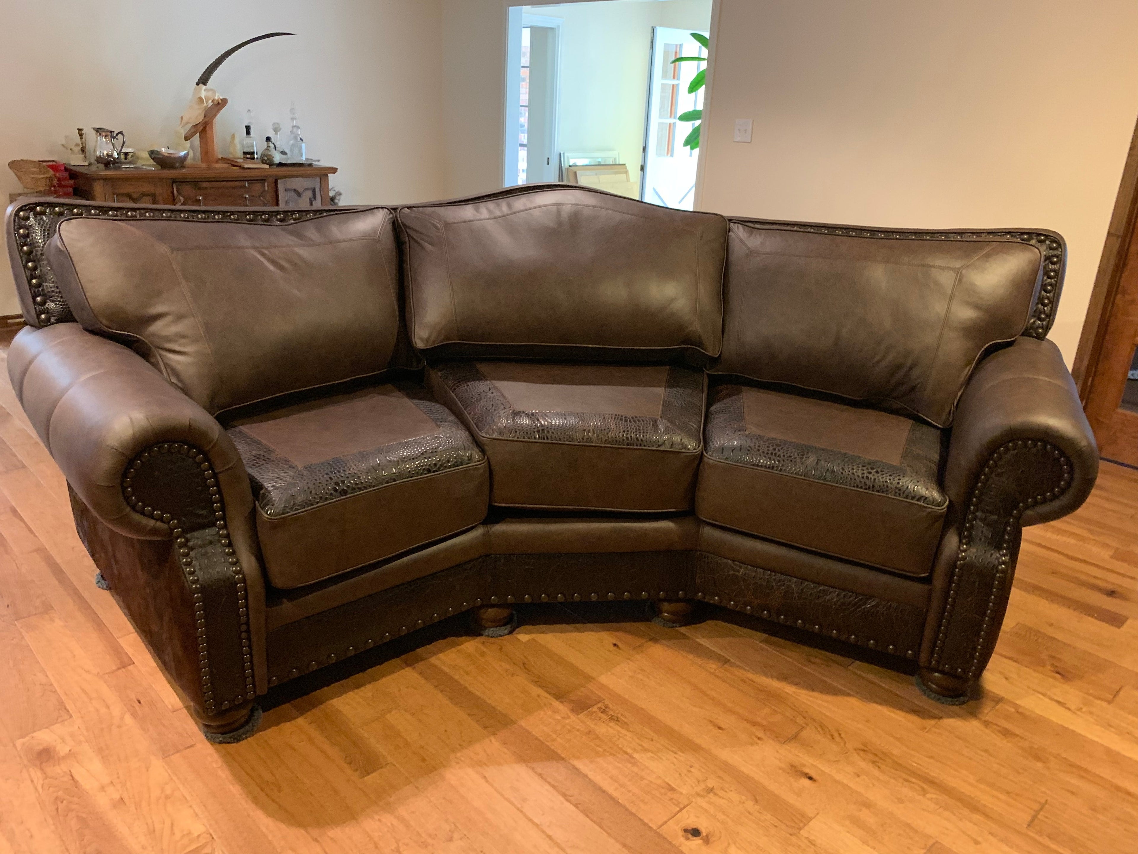 An arrangement of western leather and hide furniture custom designed for clients.