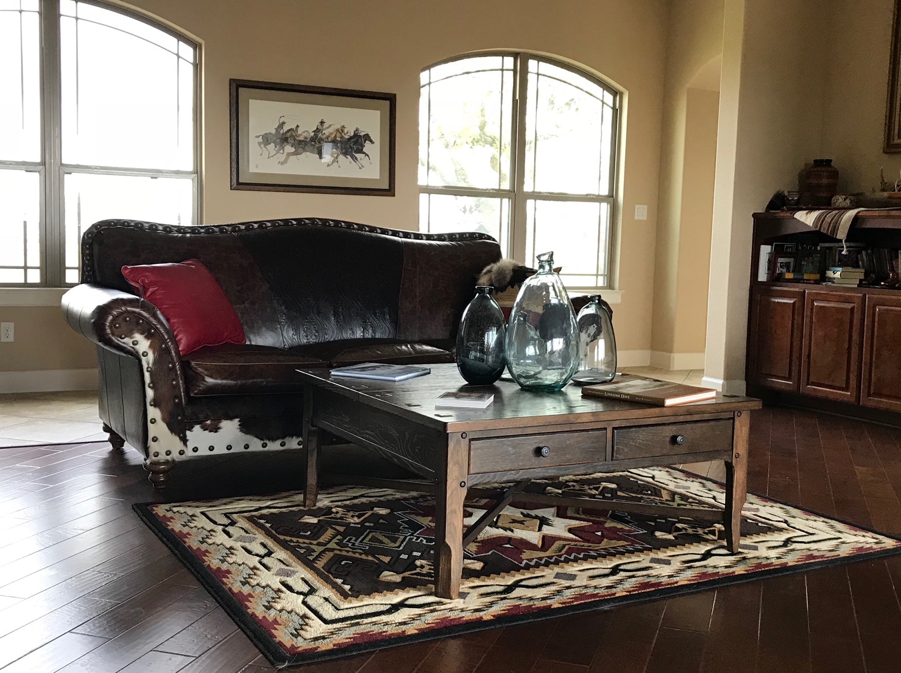 An arrangement of western leather and hide furniture custom designed for clients.