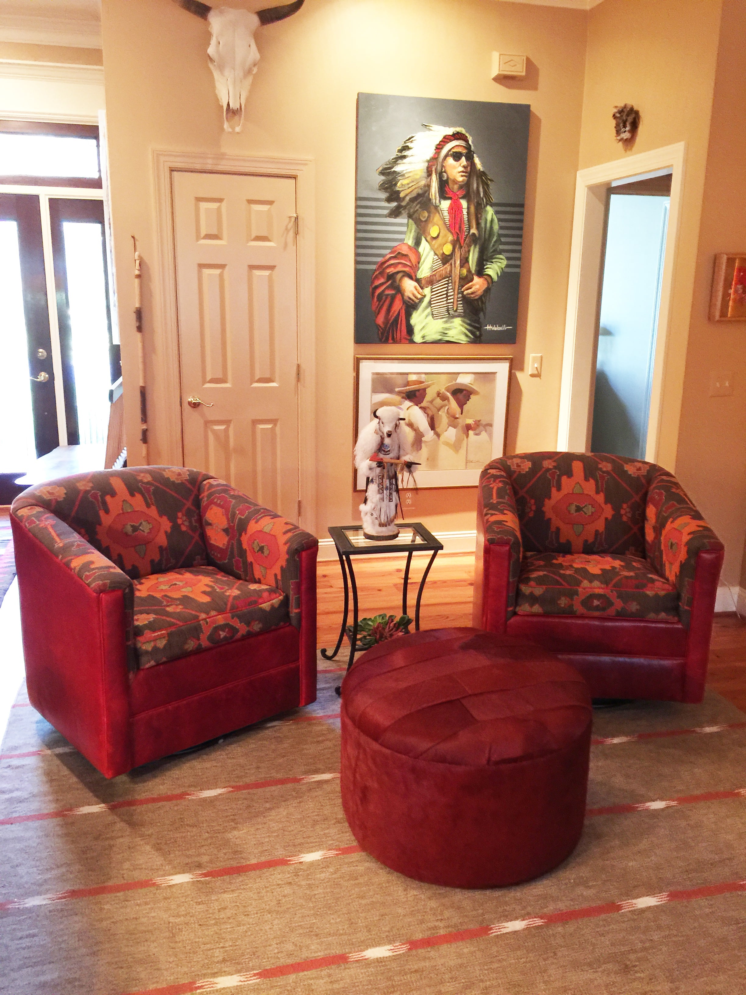 An arrangement of western leather and hide furniture custom designed for clients.