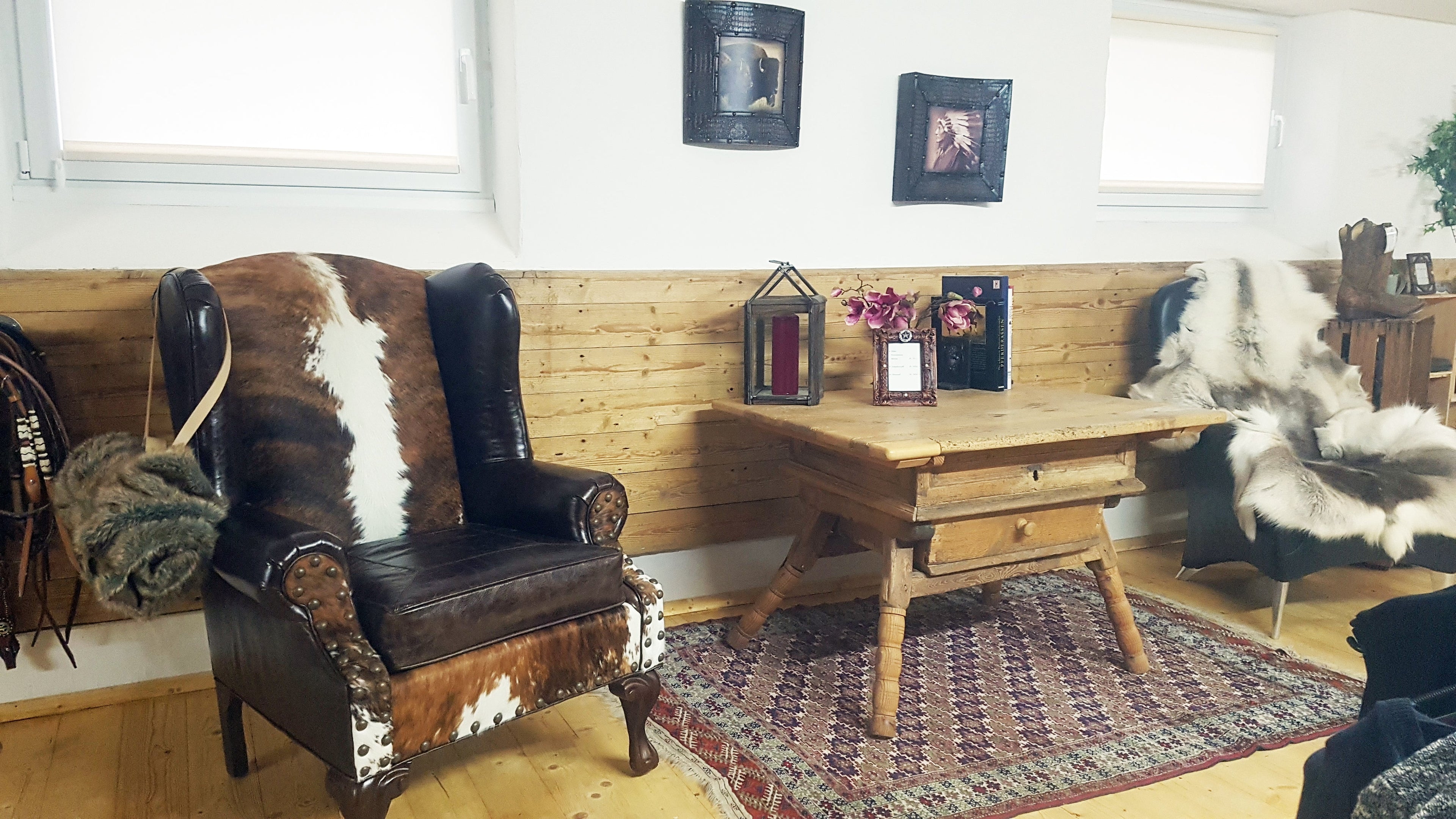 An arrangement of western leather and hide furniture custom designed for clients.