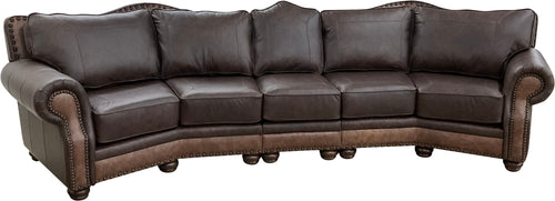 Upgrade your living space with The Houstonian Large Curved Sectional Sofa, crafted in Palio Dark Brown leather with Palio Café accents. A bold, elegant design with plush comfort and timeless Western-inspired detailing.