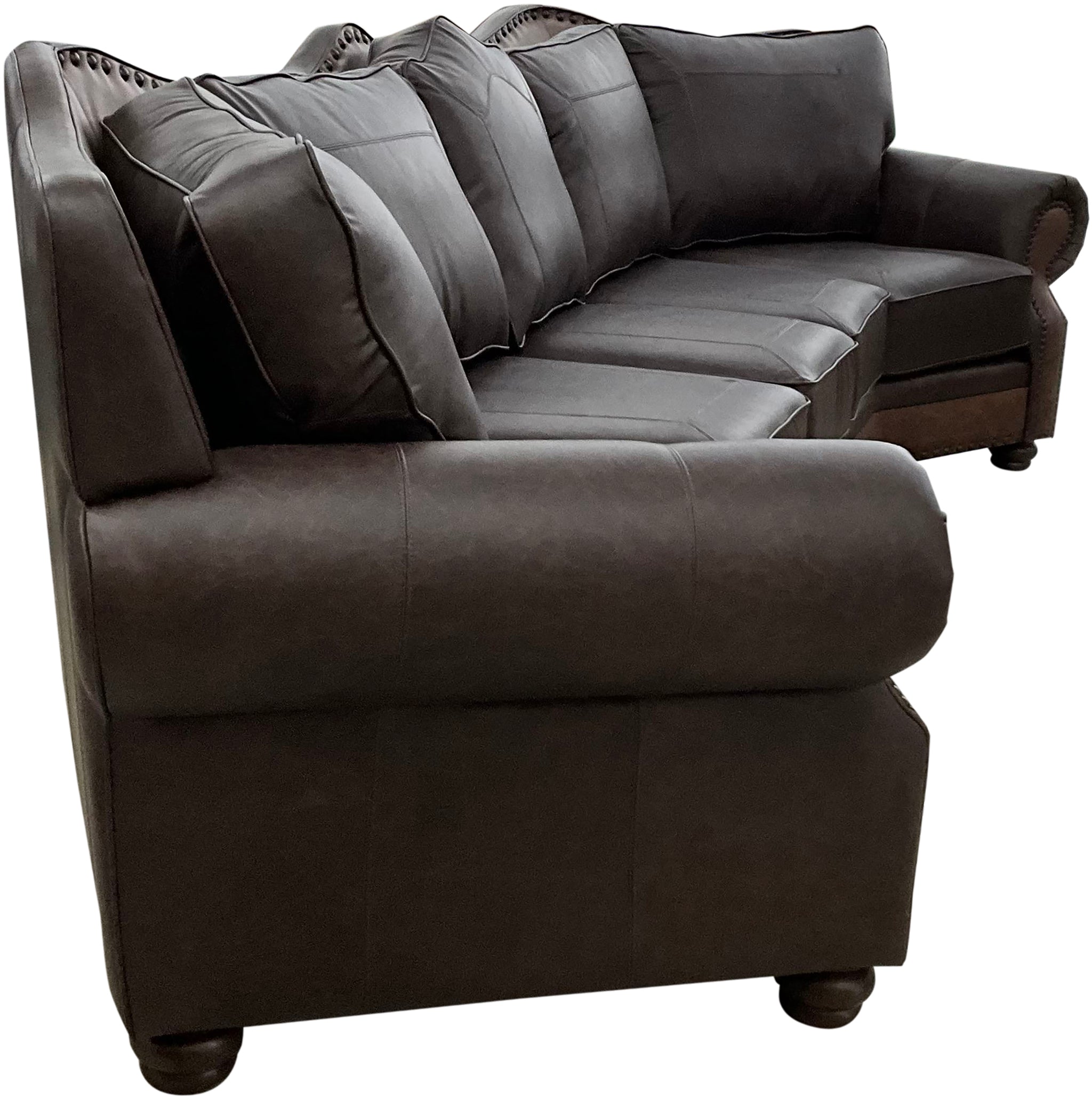 Upgrade your living space with The Houstonian Large Curved Sectional Sofa, crafted in Palio Dark Brown leather with Palio Café accents. A bold, elegant design with plush comfort and timeless Western-inspired detailing.
