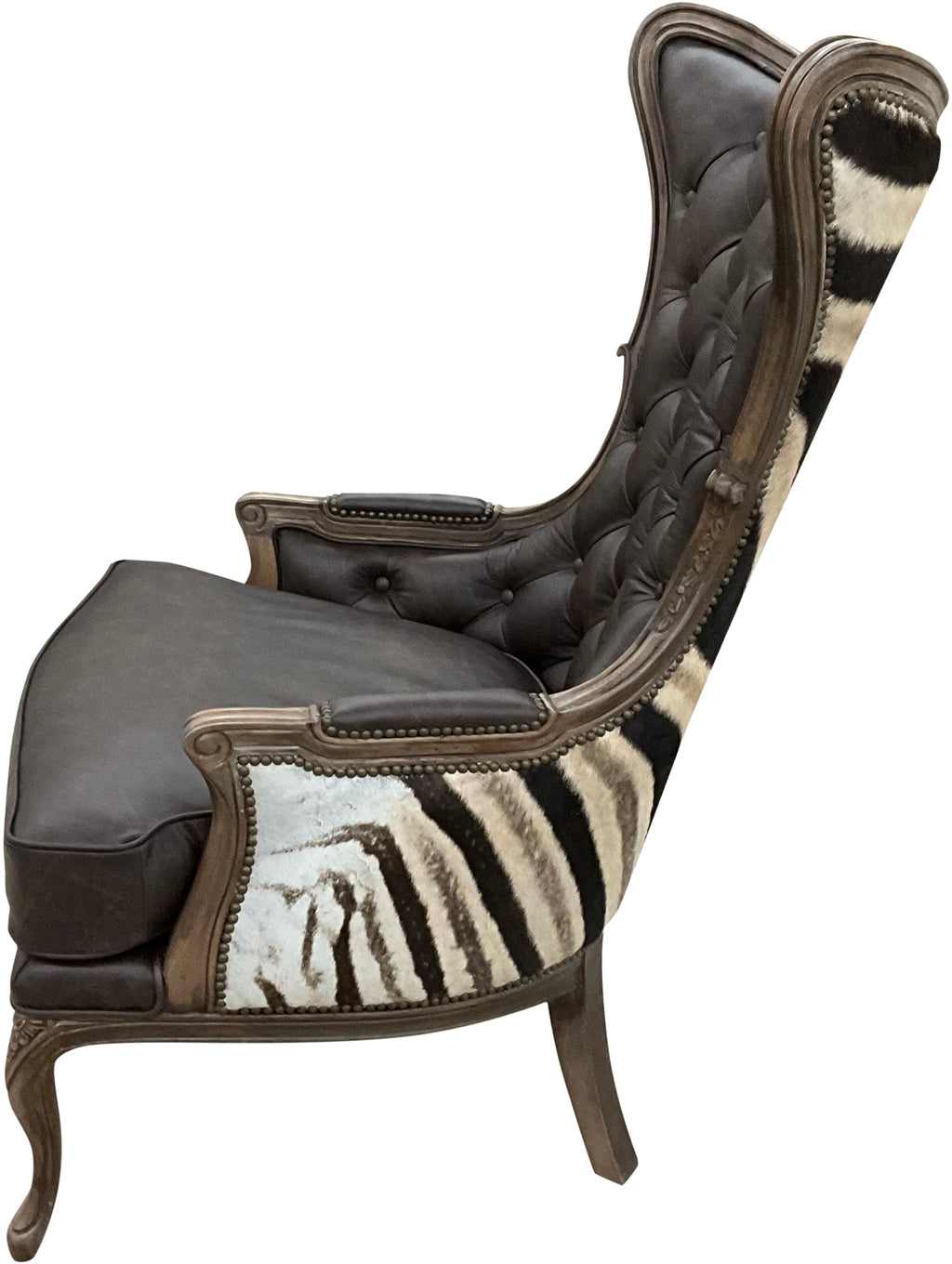 Serengeti Monarch Wingback – luxury Victorian safari style accent chair in Palio Texas leather with authentic zebra hide exterior. Perfect for high-end lodge and western interiors.