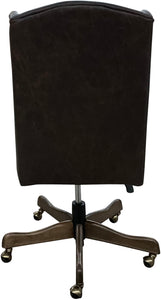 The Boardroom Desk Chair features Palio Texas full-grain leather, hand-tacked trim, and a solid wood base with brass casters. Handcrafted for comfort, durability, and executive Western elegance — fully customizable to your style.