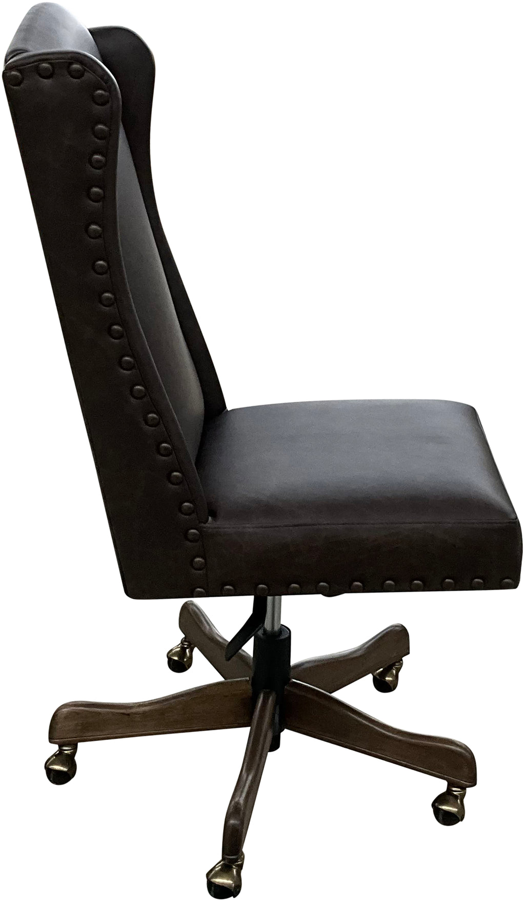 The Boardroom Desk Chair features Palio Texas full-grain leather, hand-tacked trim, and a solid wood base with brass casters. Handcrafted for comfort, durability, and executive Western elegance — fully customizable to your style.