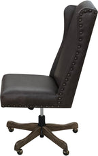 The Boardroom Desk Chair features Palio Texas full-grain leather, hand-tacked trim, and a solid wood base with brass casters. Handcrafted for comfort, durability, and executive Western elegance — fully customizable to your style.