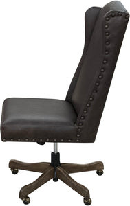 The Boardroom Desk Chair features Palio Texas full-grain leather, hand-tacked trim, and a solid wood base with brass casters. Handcrafted for comfort, durability, and executive Western elegance — fully customizable to your style.