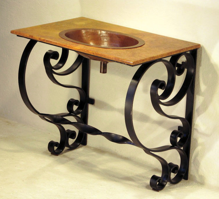 The Old Forge Copper Sink Vanity is a rustic, handcrafted bath vanity with a wrought iron base and copper sink. This one-of-a-kind vanity brings artisanal charm to any bathroom.
