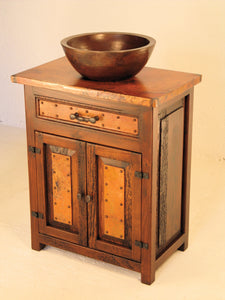 Add rustic charm to your bathroom with the Deer Valley Sink Cabinet, featuring copper accents & storage cabinets.