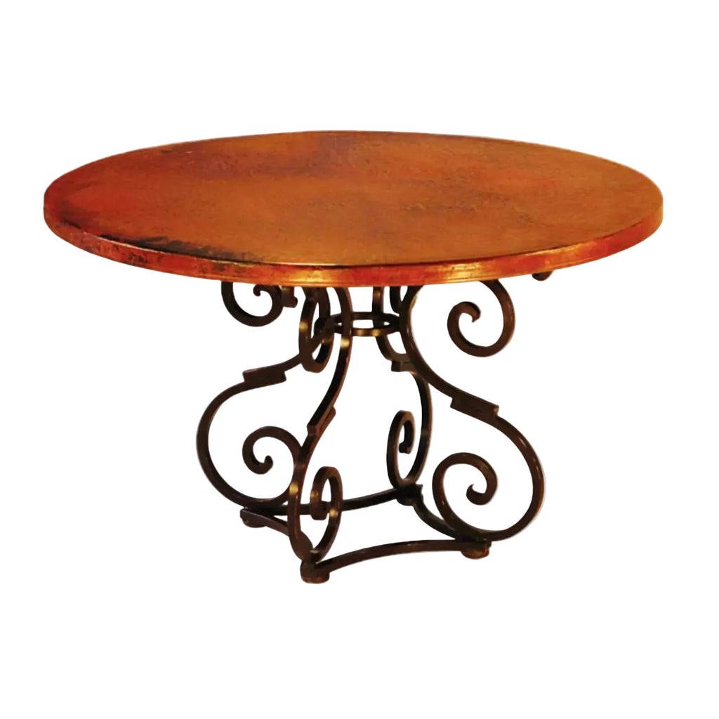 Round wooden table with decorative metal base on a white background