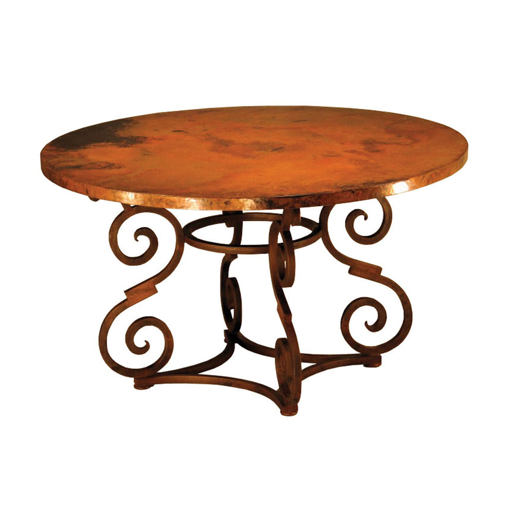 Round wooden table with decorative metal base on a white background