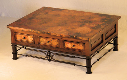 Discover the handcrafted 6-Drawer Copper Coffee Table with a Pablo wrought iron base. Features a hammered copper top, solid wood frame, and six drawers for stylish storage. Perfect rustic centerpiece for any living room.