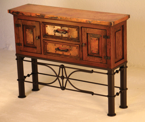 Add rustic elegance with the Small Francisco Copper Console w/ Pablo Base, featuring hand-hammered copper panels, solid wood craftsmanship, and wrought iron detailing. Only offered as shown.