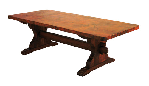 Discover the Trestle Copper Dining Table, featuring a handcrafted wood trestle base and a hammered copper top. Available in multiple sizes with custom options for a perfect fit.