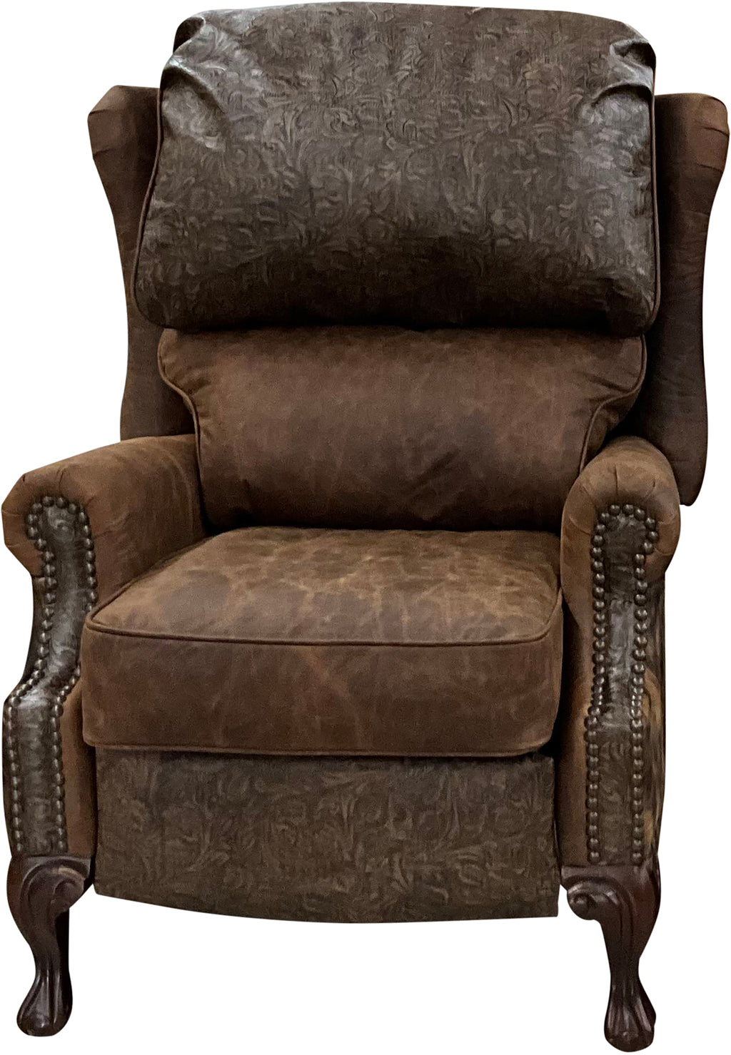 The Sandpoint Recliner combines Cora Pecan leather, Floral Bone Black embossed accents, and Hair-on-Hide Dark Exotic cowhide. A handcrafted Western-style recliner with classic wingback design, double bustleback cushions, and classic nailhead trim.
