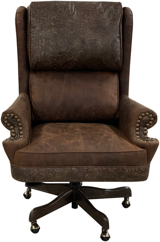 The President’s Executive Chair combines Cora Pecan leather, Floral Bone Black accents, and Hair-on-Hide Dark Exotic cowhide. A handcrafted Western wingback chair designed for power, prestige, and comfort.