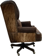The President’s Executive Chair combines Cora Pecan leather, Floral Bone Black accents, and Hair-on-Hide Dark Exotic cowhide. A handcrafted Western wingback chair designed for power, prestige, and comfort.