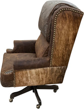 Load image into Gallery viewer, The President’s Executive Chair combines Cora Pecan leather, Floral Bone Black accents, and Hair-on-Hide Dark Exotic cowhide. A handcrafted Western wingback chair designed for power, prestige, and comfort.