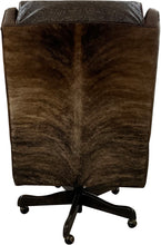 Load image into Gallery viewer, The President’s Executive Chair combines Cora Pecan leather, Floral Bone Black accents, and Hair-on-Hide Dark Exotic cowhide. A handcrafted Western wingback chair designed for power, prestige, and comfort.