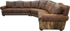 The Sandpoint Sectional features Cora Pecan leather, Floral Bone Black accents, and Hair-on-Hide Dark Exotic cowhide. With a large three-cushion pie piece and three-point yoke back cushions, this Western sectional offers luxury, comfort, and bold style.