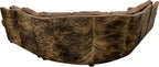 The Sandpoint Sectional features Cora Pecan leather, Floral Bone Black accents, and Hair-on-Hide Dark Exotic cowhide. With a large three-cushion pie piece and three-point yoke back cushions, this Western sectional offers luxury, comfort, and bold style.
