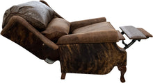 Load image into Gallery viewer, The Sandpoint Recliner combines Cora Pecan leather, Floral Bone Black embossed accents, and Hair-on-Hide Dark Exotic cowhide. A handcrafted Western-style recliner with classic wingback design, double bustleback cushions, and classic nailhead trim.
