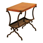 The Revista Magazine Copper Table combines rustic copper beauty with functional design. Features a hammered copper top, iron base, and a lower shelf for magazines or storage.