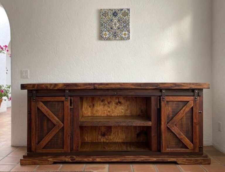 The Old World Buffet Cabinet is made using new and reclaimed pine wood.&nbsp; It has two barn doors to an open shelf, two drawers and two cabinet doors.&nbsp; Each with iron hardware.&nbsp; Cabinet handles are hand made in house. Single shelf inside the two barn doors.