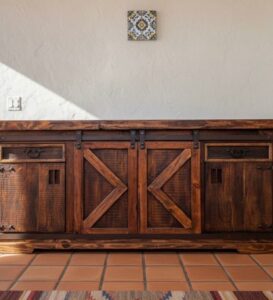 The Old World Buffet Cabinet is made using new and reclaimed pine wood.&nbsp; It has two barn doors to an open shelf, two drawers and two cabinet doors.&nbsp; Each with iron hardware.&nbsp; Cabinet handles are hand made in house. Single shelf inside the two barn doors.