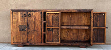 Load image into Gallery viewer, old world rustic credenza reclaimed Wooden sideboard with rustic design against a beige wall