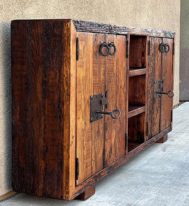 old world rustic credenza reclaimed Wooden cabinet with rustic design and key lock on a neutral background