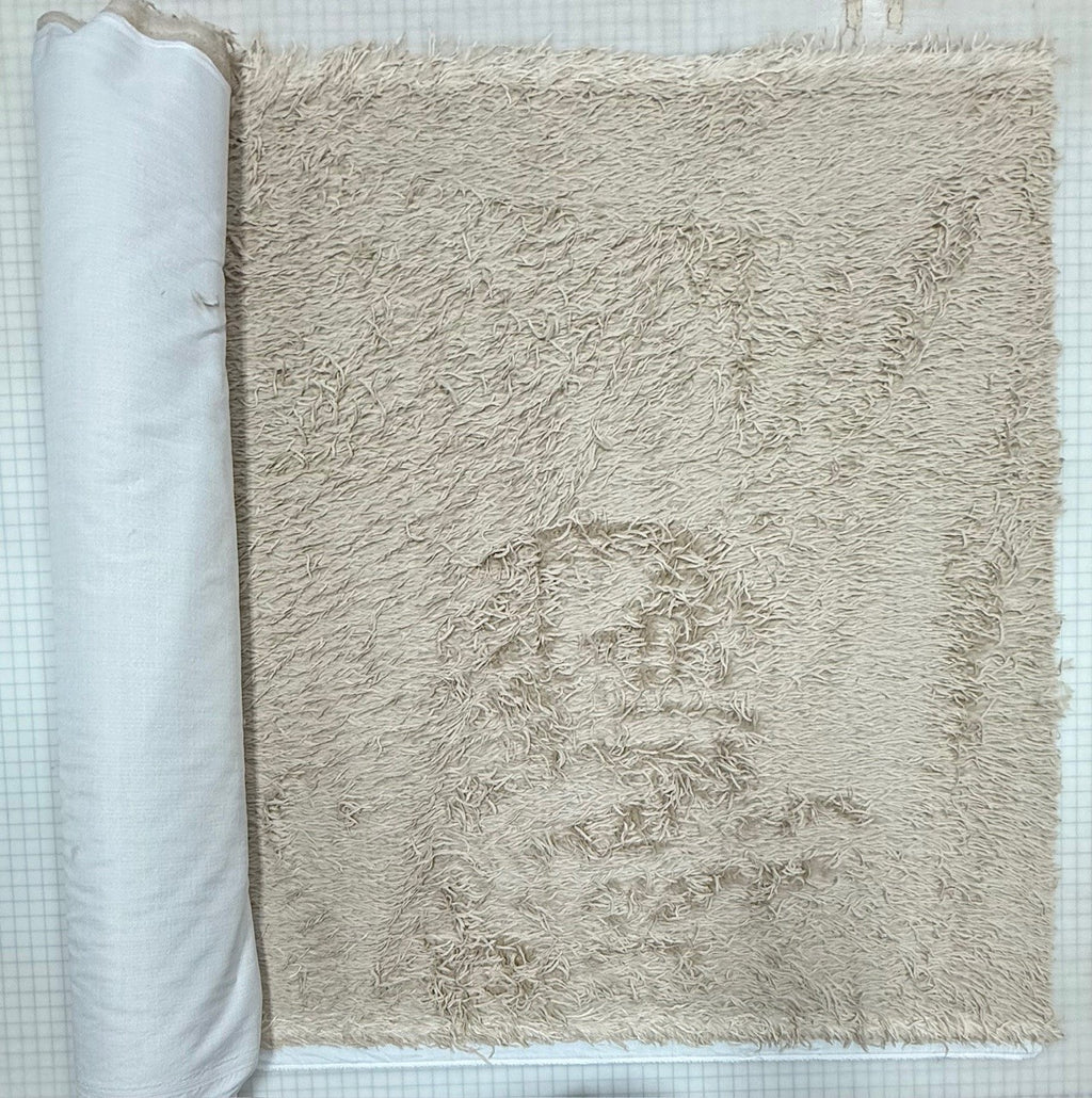 Emu Eggshell Faux Fur Fabric