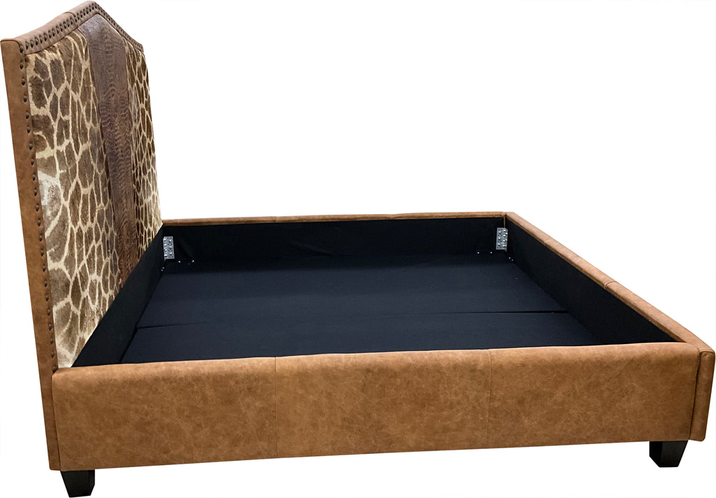 The Serengeti Bed features authentic Giraffe hide, Gator Rustic Cognac leather, and a Landman Saddle leather base. A handcrafted Western bed that blends exotic luxury with bold, natural elegance — made to be unforgettable.