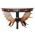 A rustic Half Moon Moose Console Table with a circular brown wood top and a moose head design in the center, supported by a black metal leg.