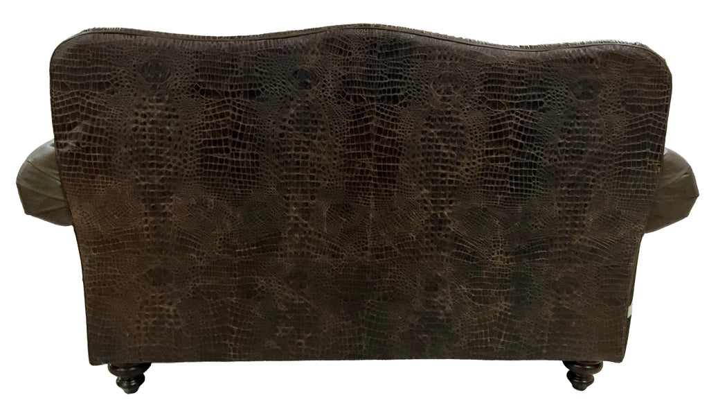 Western leather loveseat with Galveston Vintage leather, Rustic Walnut gator-embossed accents, and black & white salt-and-pepper cowhide panels. Luxury ranch loveseat.