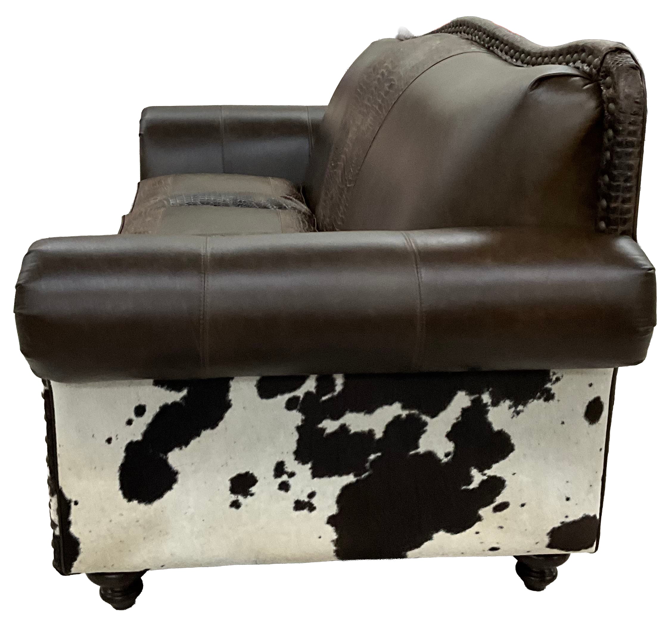 Western leather loveseat with Galveston Vintage leather, Rustic Walnut gator-embossed accents, and black & white salt-and-pepper cowhide panels. Luxury ranch loveseat.